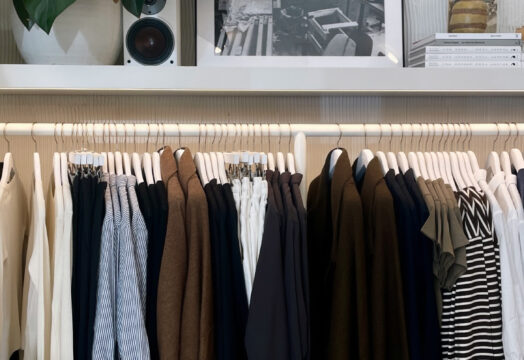 Modest Fashion 2026: 6 Powerful Trends Defining Sustainable, Modern Modest Sty A woman wearing a structured, earth-toned luxury modest outfit featuring a longline blazer and wide-leg trousers, representing 2026 sustainable fashion trends.