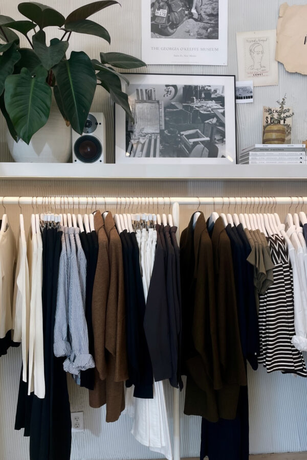 Modest Fashion 2026: 6 Powerful Trends Defining Sustainable, Modern Modest Sty A woman wearing a structured, earth-toned luxury modest outfit featuring a longline blazer and wide-leg trousers, representing 2026 sustainable fashion trends.