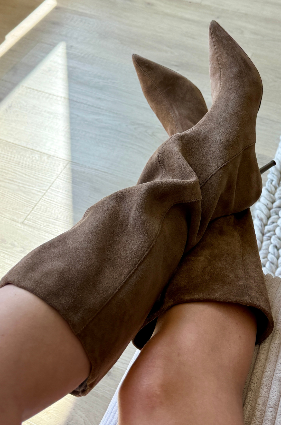 Brown suede ankle boots showcasing the Fall 2026 fabric trends