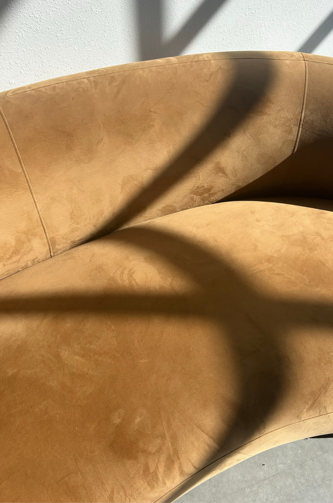 Luxury suede sofa in warm brown tones inspired by Fall 2026 textures
