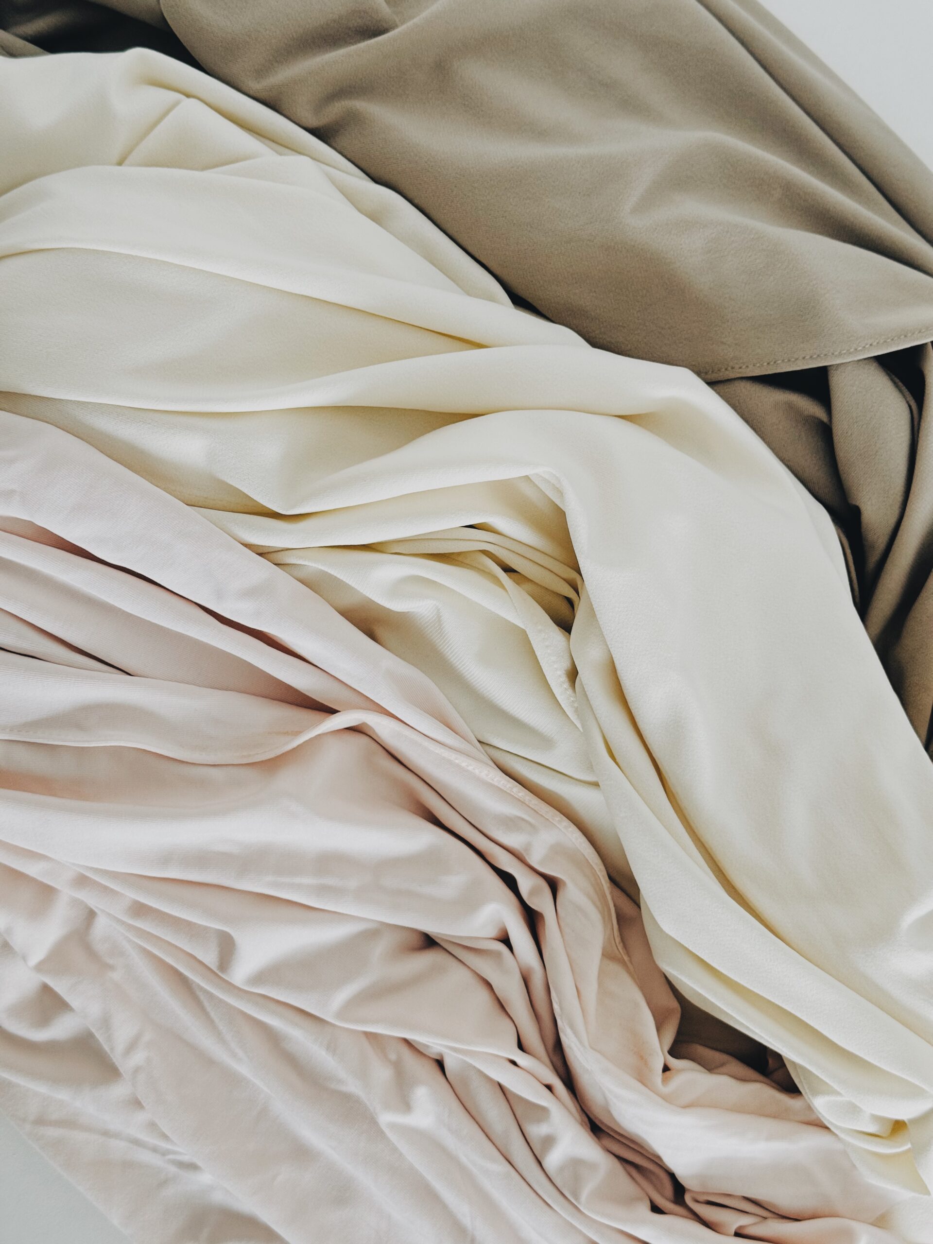 Close up of premium jersey hijab fabric texture, Soft stretch jersey fabric with smooth knit texture Jersey hijab styled for everyday modest fashion