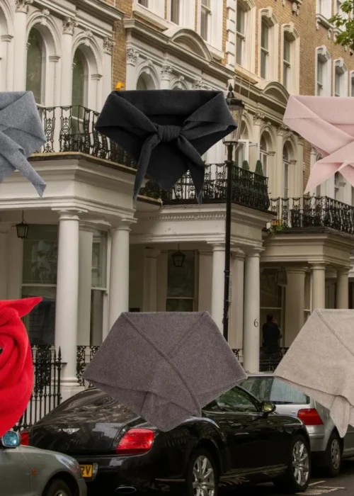 Triangle scarves styled in different ways on a London street
